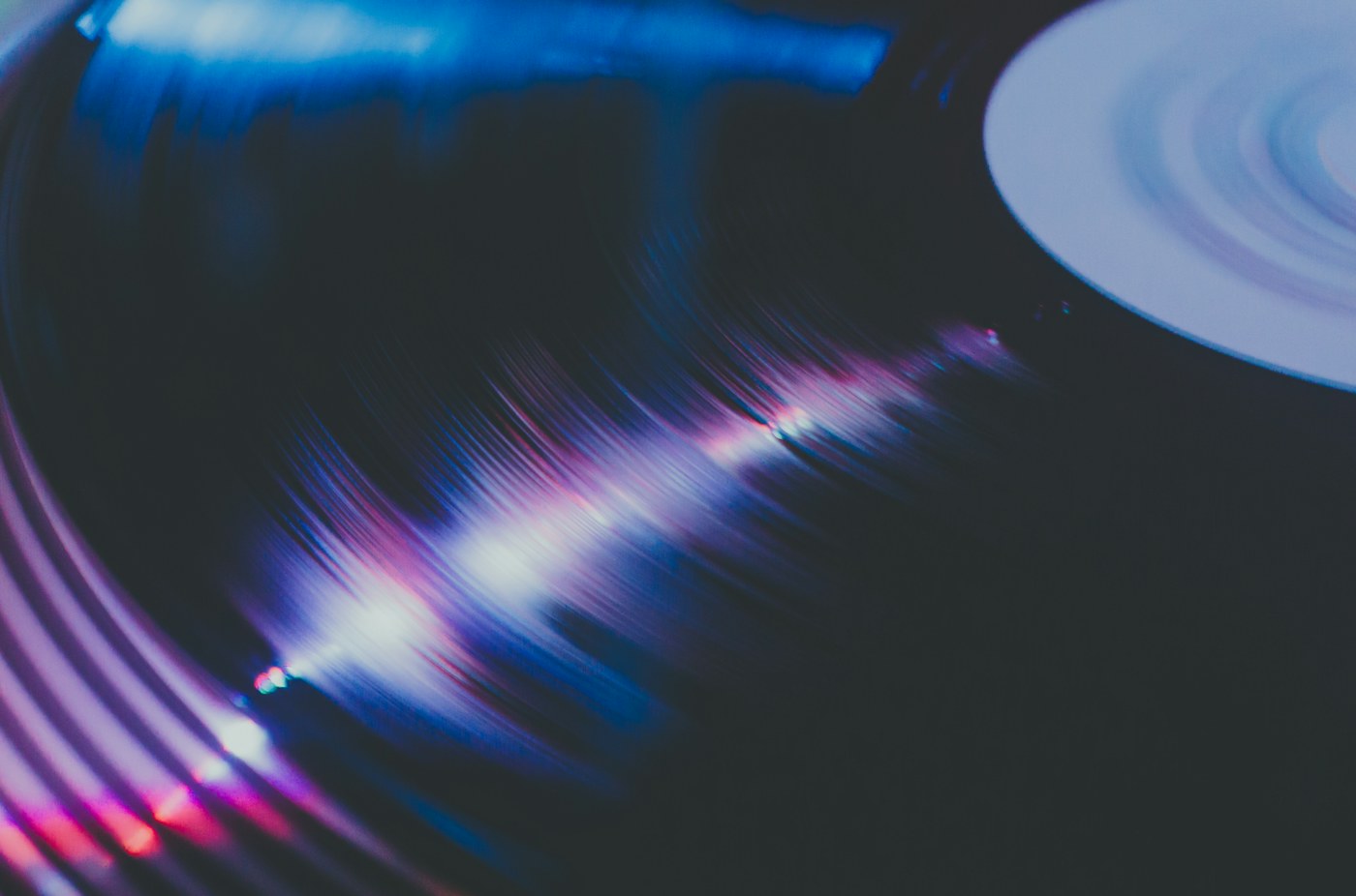 A vinyl record playing on a turntable